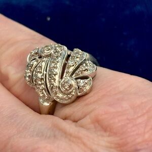 Ladies 14k white gold ring, .28 ct. total, with unique swirl design